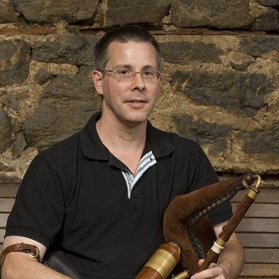 Terry Hartzell with uilleann pipe